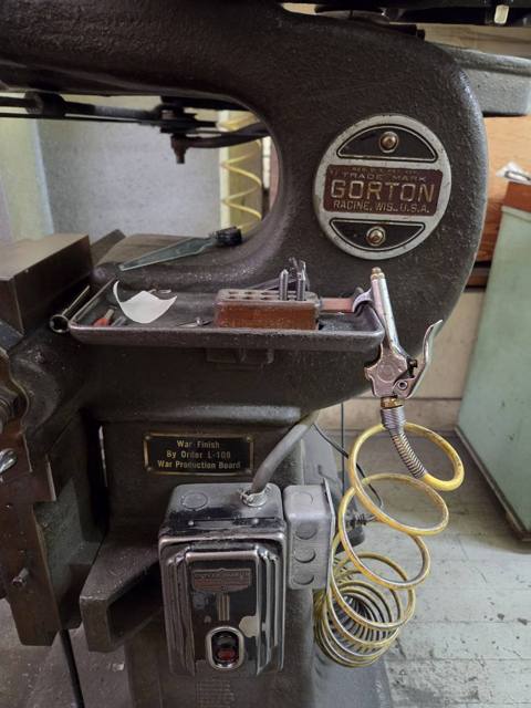 Gorton badge and War Production Board plate