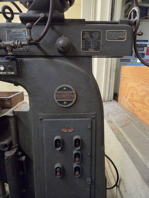 Column with Gorton badge and push-button station